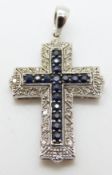 A 9ct white gold cross pendant set with sapphires and diamonds, 2.