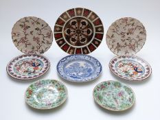 Eight plates including Crown Derby Imari 1128, Chinese famille rose,