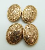 A pair of 9ct gold cufflinks with foliate decoration, 8.