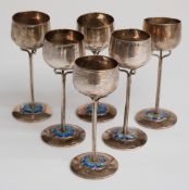 A set of six Edward VII Mappin and Webb hallmarked silver Art Nouveau / Arts & Crafts floral enamel