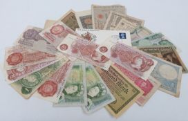 A collection of used bank notes comprising mainly UK ten shilling examples and German early 20thC