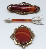 A Victorian silver brooch in the form of an arrow (10.