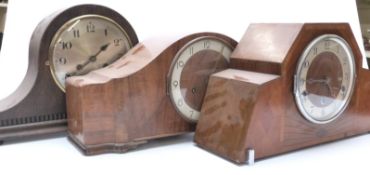 Seven various mantel clocks including a three train example in Deco style inlaid case,