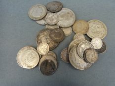 A wooden box containing approximately 185g of mixed silver coinage Queen Victoria onwards,