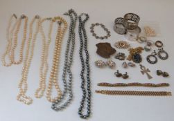 A collection of costume jewellery to include silver rings, Victorian silver brooch, silver bracelet,