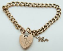 A 9ct rose gold curb link bracelet with padlock clasp, 16.
