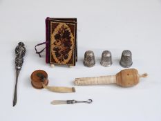 Sewing related items including two hallmarked silver thimbles,