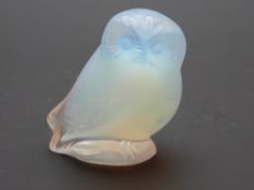 Lalique Nyctal opalescent glass owl signed Lalique France to base, 5.5cm tall.