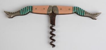 A novelty corkscrew depicting a pair of legs, marked made in Germany,