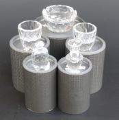 Five Swarovski Crystal cut glass vases and bowls, largest 9.