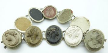 A cameo necklace/ choker made up of 12 lava cameos of young women