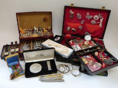 A collection of costume jewellery including brooches, bracelets, diamanté necklace, cufflinks,