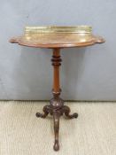 Burr walnut inlaid side table raised on a carved tripod base with brass gallery H75cm