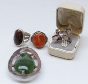 A large silver pendant set with a pear shaped nephrite jade cabochon,