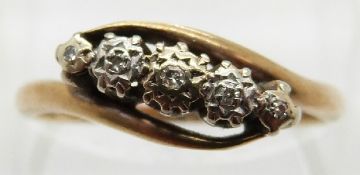 An 18ct gold ring set with five diamonds,