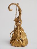A gilt metal posy holder with embossed twig and foliate design, height 11.