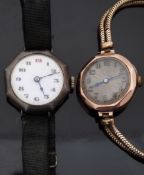 Ladies 9ct gold wristwatch with blued hands, Arabic numerals and engine turned face,