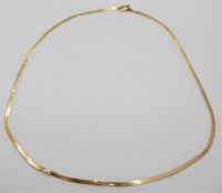 A 9ct gold ribbon necklace, 2.