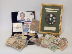 An amateur collection of bank notes and coins to include Georgian and Victorian crowns, Nazi,