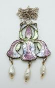 A silver pendant set with enamel in the form of an orchid with three drop pearls,