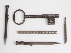 Four silver plate pencils and a large key