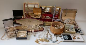 A group of paste brooches and necklaces,