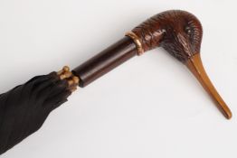 Late 19thC/20thC parasol with carved figural duck handle, plated collar, rosewood shaft,