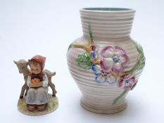 Clarice Cliff vase and a Goebel figure,