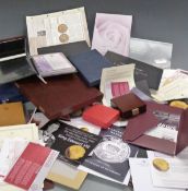 A quantity of coin cases and certificates etc