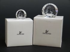 A pair of Swarovski Crystal cut glass signed special event paperweights Columbine,
