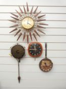 A c1950/1960 sunburst wall clock by Paico together with a Dupont frying pan wall clock,