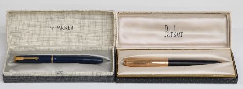 Two Parker fountain pens comprising a Slimfold with blue barrel and cap,