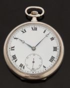 Silver open faced keyless winding pocket watch with Roman numerals,