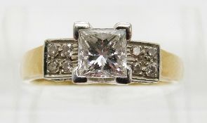 A 18ct gold ring set with a princess cut diamond of approximately 0.