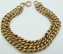 A 9ct gold curb link bracelet, 8.
