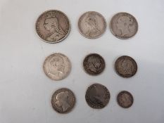 A small collection of silver coinage including Elizabeth II pierced sixpence 1567, Victorian crown,