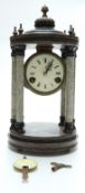 French four pillar mantel clock in marble construction,