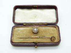 Victorian stud set with a pearl surrounded by rose cut diamonds and a 15ct gold stick pin set with