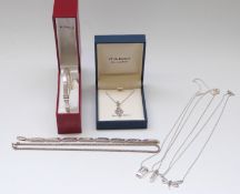 A silver bangle, silver bracelet set with cubic zirconia, necklace set with cubic zirconia,