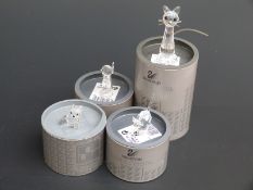 Four Swarovksi Crystal Cats, largest 7.