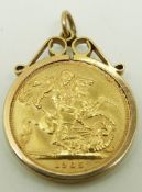 A 1965 full sovereign in a 9ct gold clip mount, 9.