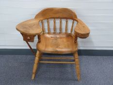 Arts and Crafts bespoke elm elbow chair with drawer to one arm and swivel container to other