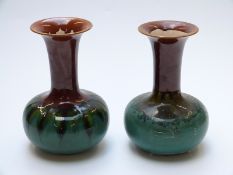 Two Sir Christopher Dresser for Linthorpe Pottery vases, one impressed HT and 363,