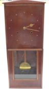 Hand built wall / free standing clock in wooden case, with brass two train movement,