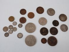 A quantity of coins including 1854 Victorian penny, pre 1947 silver,