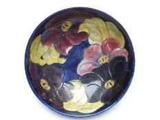 Moorcroft pedestal bowl in Clematis pattern on a blue ground,
