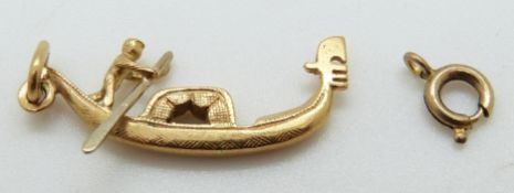 An 18ct gold charm depicting a gondola, 3.