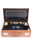 Leather cased hallmarked silver and ivory mounted travelling set comprising five hallmarked silver