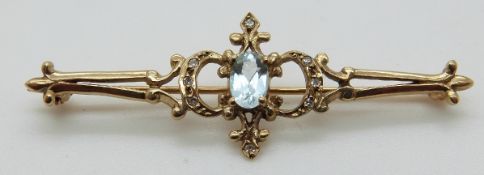 A 9ct gold brooch set with an aquamarine and diamonds, 2.7g, L4.