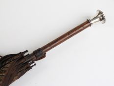 Edwardian parasol, the hallmarked silver handle with hand-painted pheasant decoration,